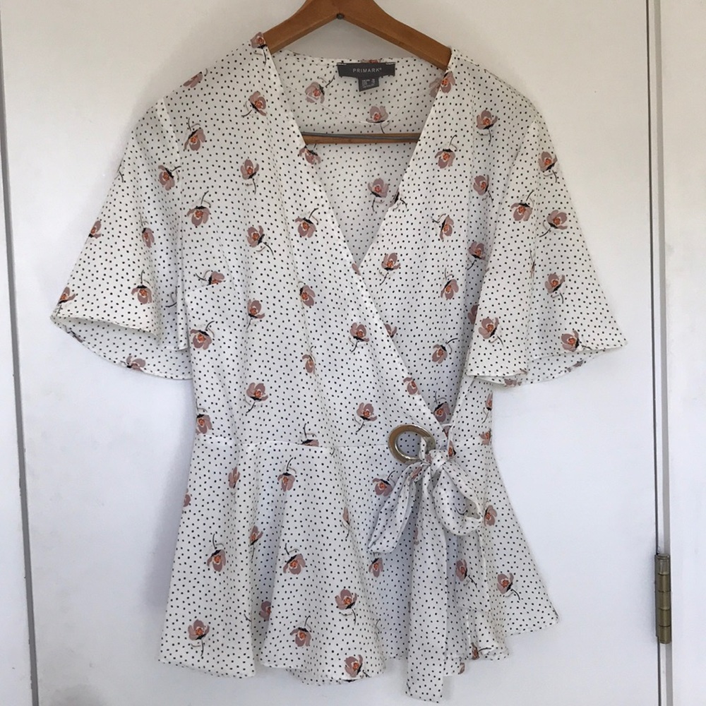 Dressy Peplum top with side bow tie